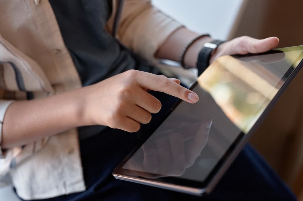 close-up-of-childs-hand-tapping-screen-of-tablet_REDUCED