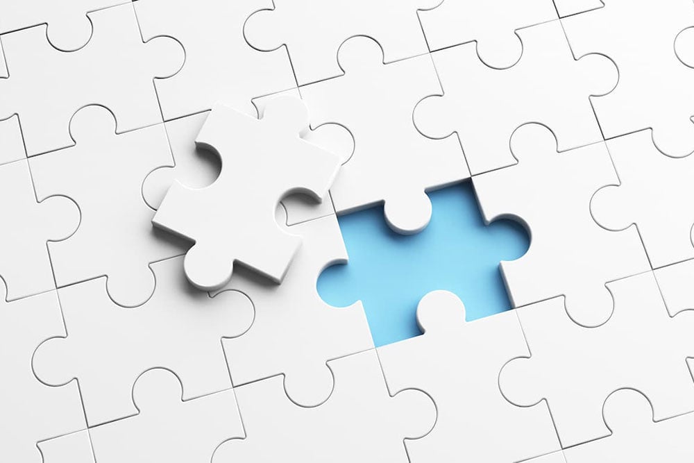 putting-the-last-piece-of-jigsaw-puzzle-to-complet_REDUCED2